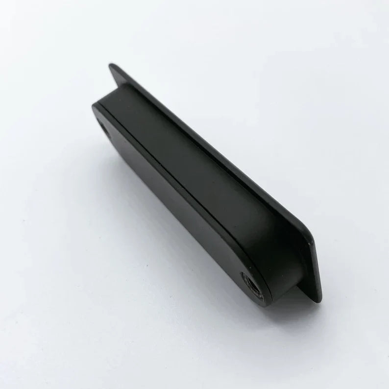 Recessed Matte Black Drawer Pulls.