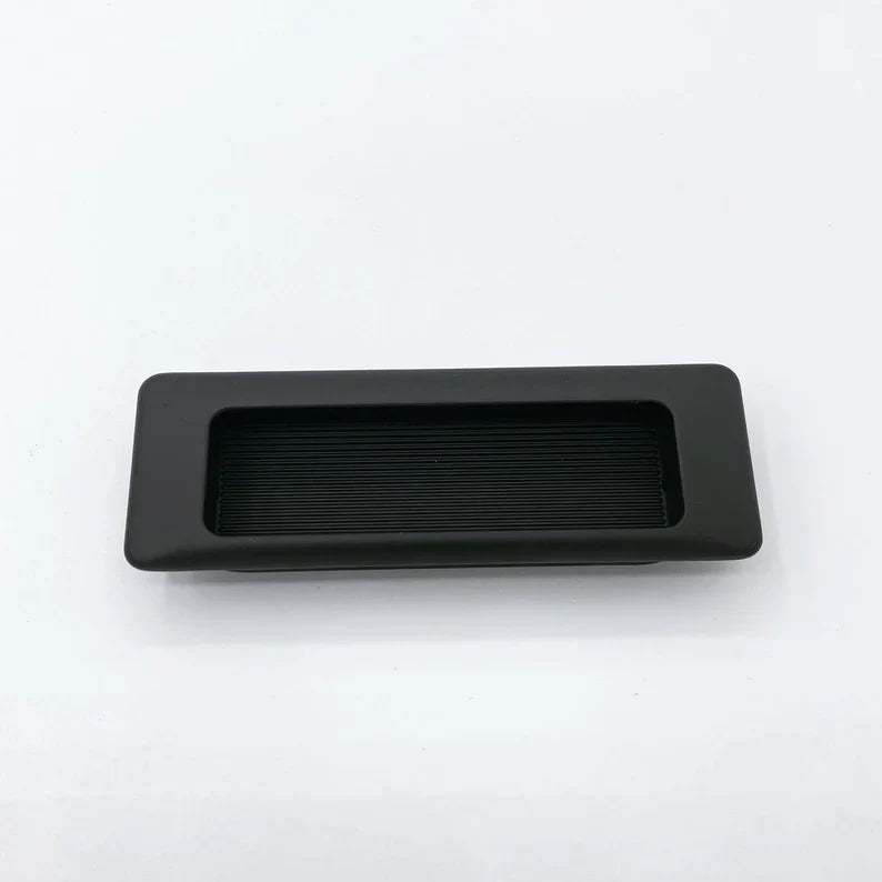 Recessed Matte Black Drawer Pulls.