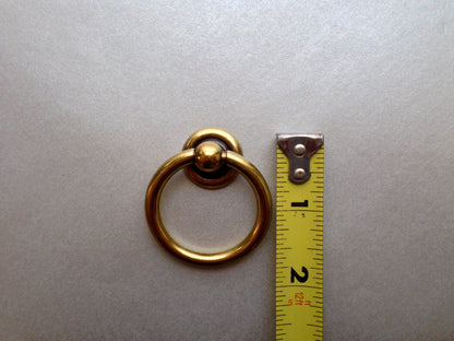 Plain Antique Brass "Capri" Ring Drawer Pulls.