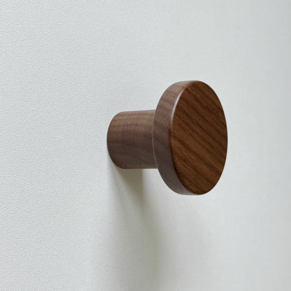 Modern "Pinta" Round Wall Hook in Lacquered Walnut.