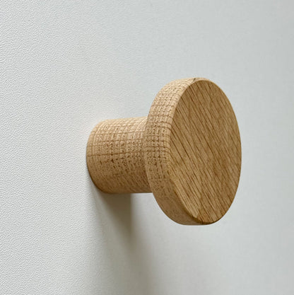 Modern "Pinta" Round Wall Hook in Unlacquered Oak.