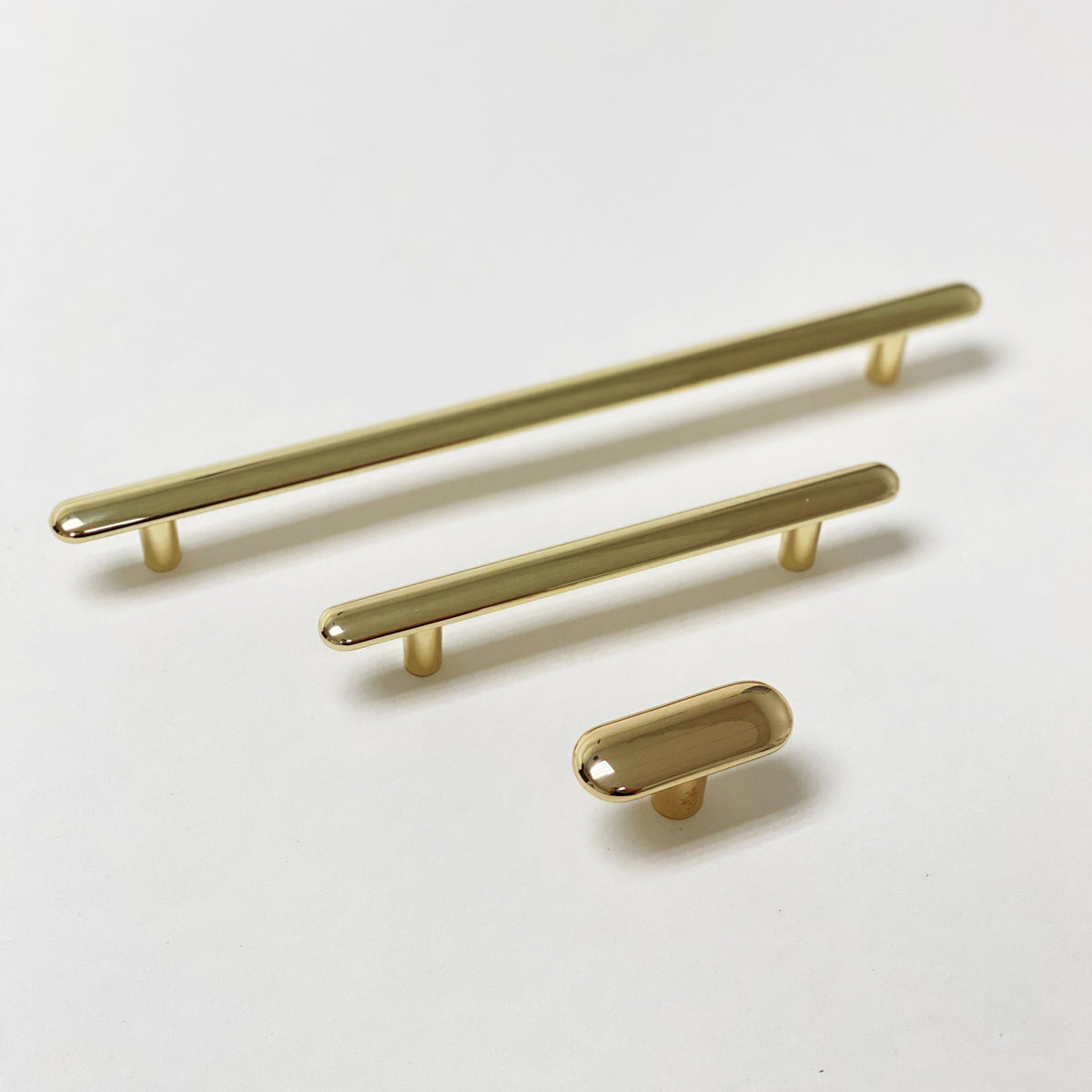 Polished Brass "Chandler" Cabinet Knobs and Drawer Pulls.