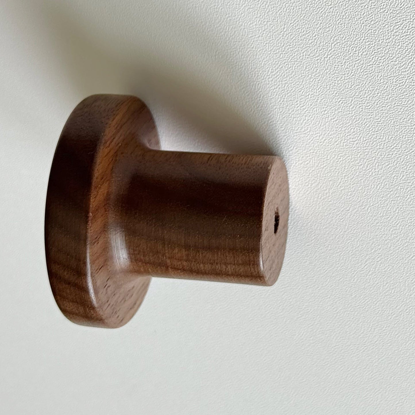 Modern "Pinta" Round Wall Hook in Lacquered Walnut.
