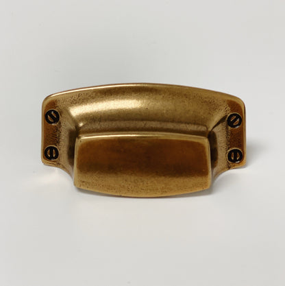 Drawer Cup Pull "Tuscany" in Antique Brass.