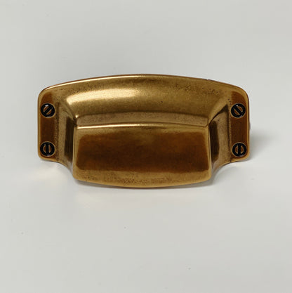 Drawer Cup Pull "Tuscany" in Antique Brass.