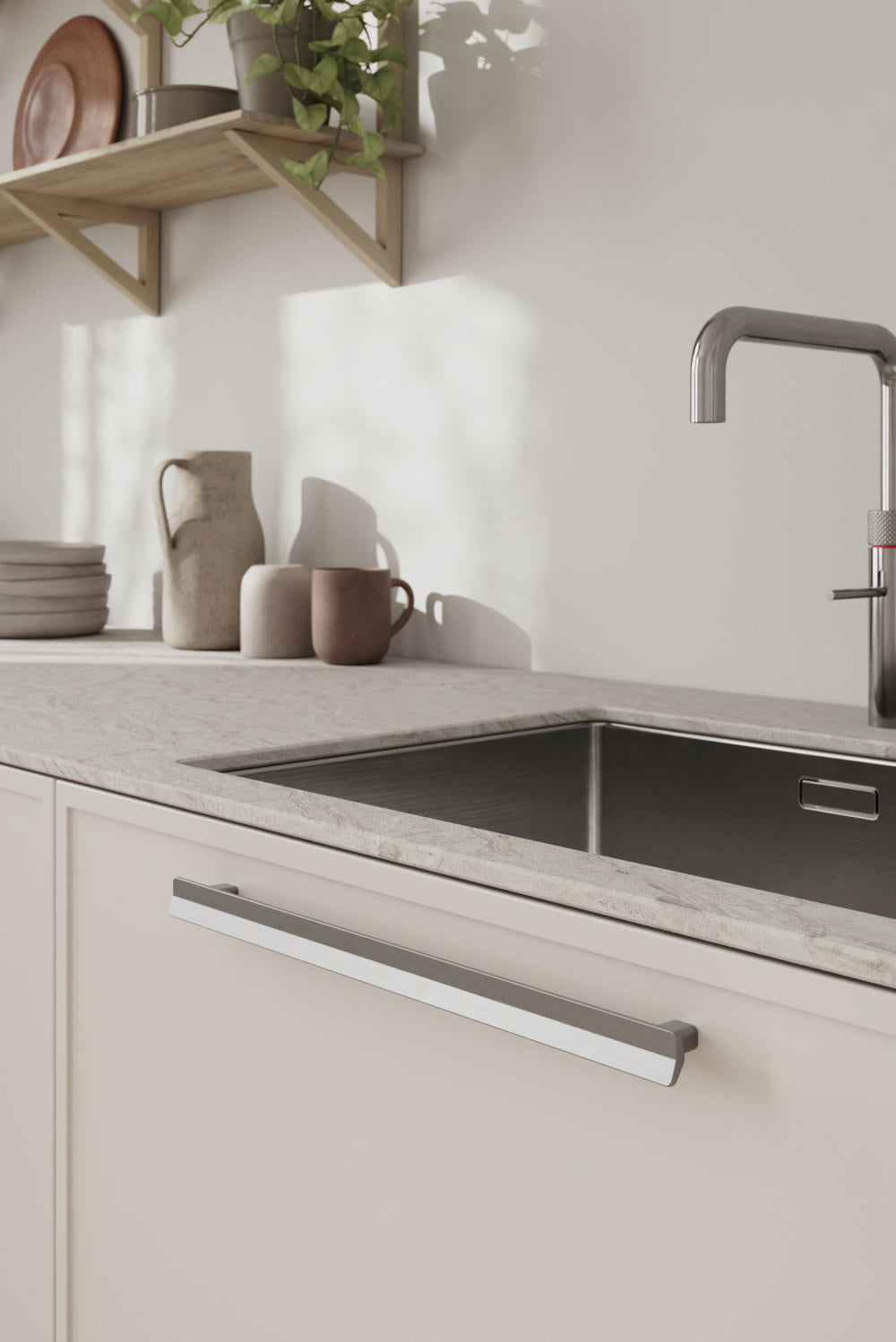 Satin Steel "Vis a Vis" Cabinet Knob and Drawer Pulls.
