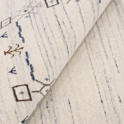 Ivory And Blue Tribal Border Design Hand Loomed Wool Area Rug.