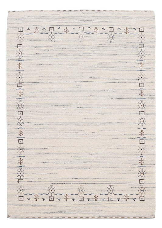 Ivory And Blue Tribal Border Design Hand Loomed Wool Area Rug.