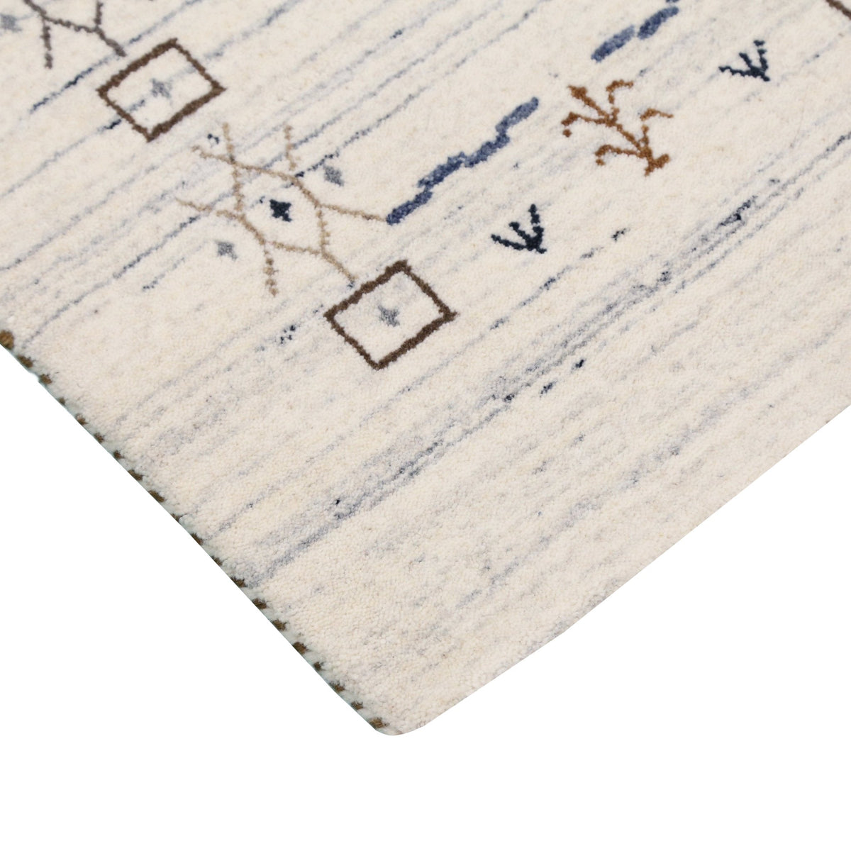 Ivory And Blue Tribal Border Design Hand Loomed Wool Area Rug.