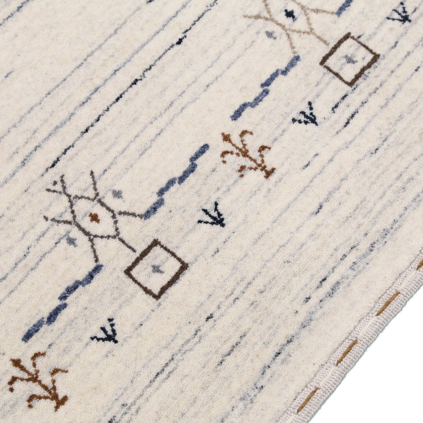 Ivory And Blue Tribal Border Design Hand Loomed Wool Area Rug.