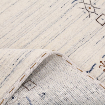 Ivory And Blue Tribal Border Design Hand Loomed Wool Area Rug.