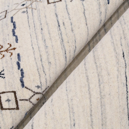 Ivory And Blue Tribal Border Design Hand Loomed Wool Area Rug.