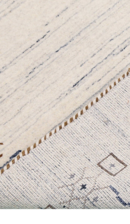 Ivory And Blue Tribal Border Design Hand Loomed Wool Area Rug.