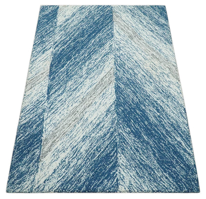 Ivory And Blue Modern Abstract Hand Woven Wool Area Rug.