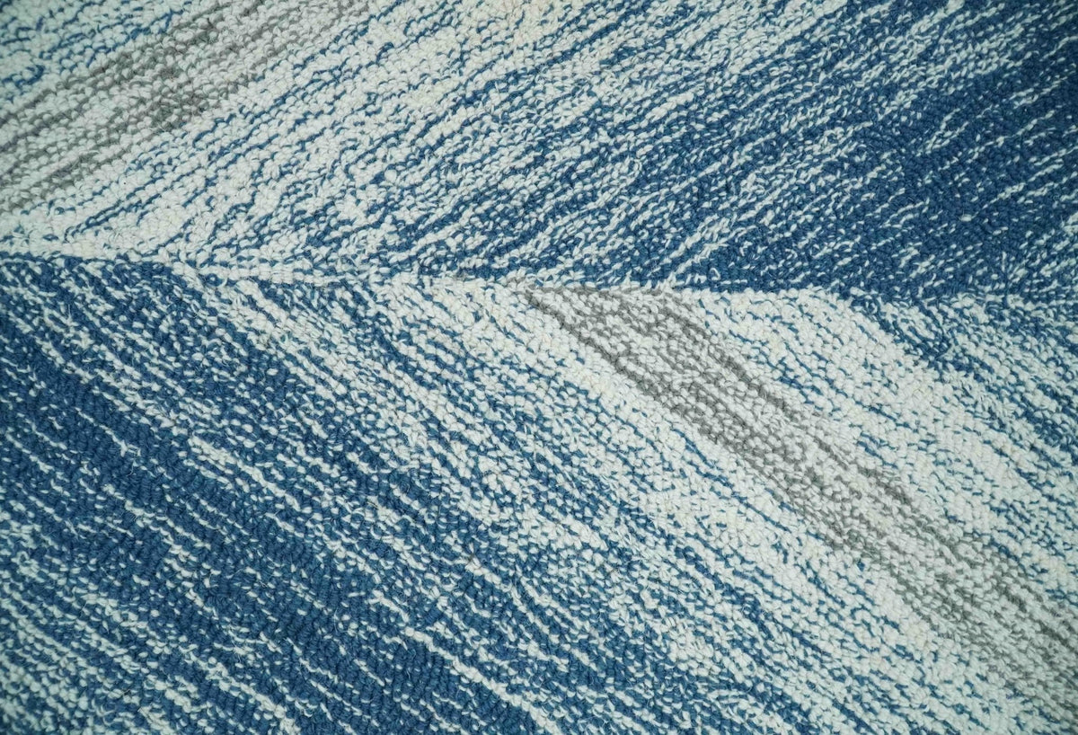 Ivory And Blue Modern Abstract Hand Woven Wool Area Rug.