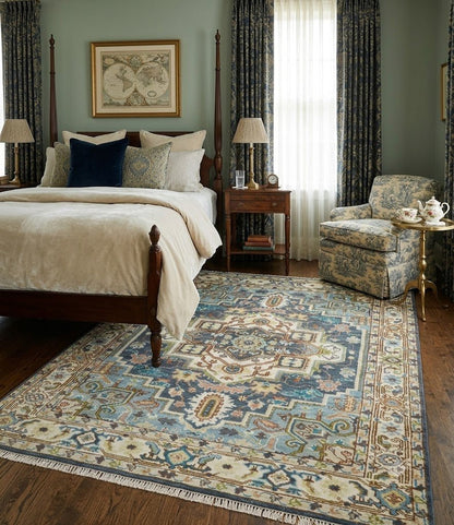 Ivory, Blue, Rust and Beige Hand knotted Traditional Heriz wool Area Rug.