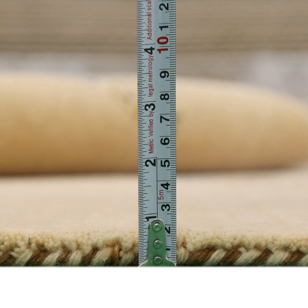 Ivory Border Patterns Hand Loomed Wool Area Rug.