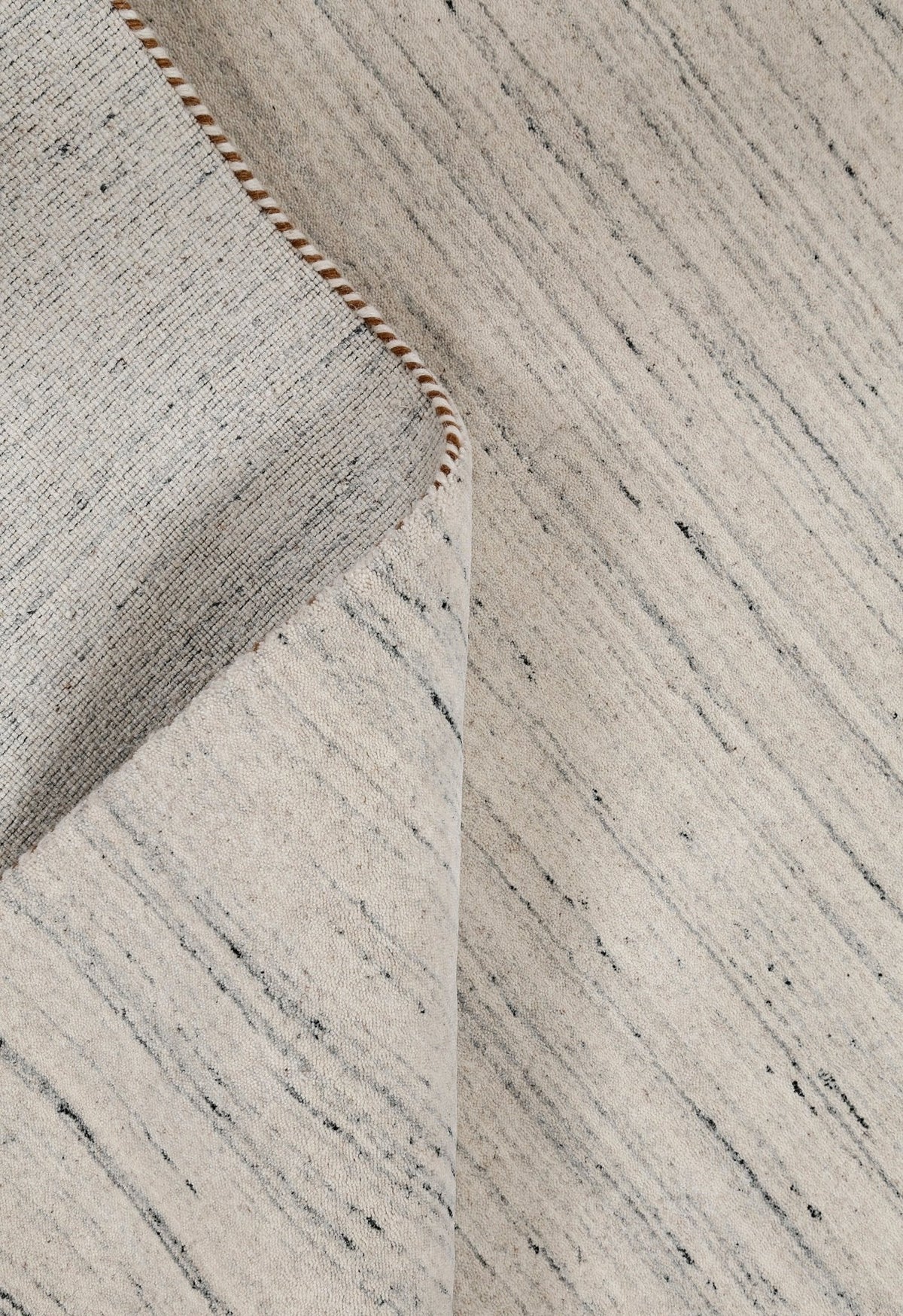 Ivory Modern Style Hand Loomed Wool Area Rug.