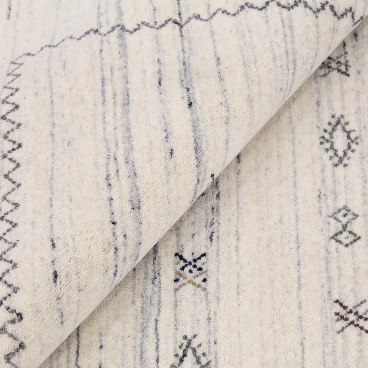Ivory Modern Tribals Design Hand Loomed Wool Area Rug.