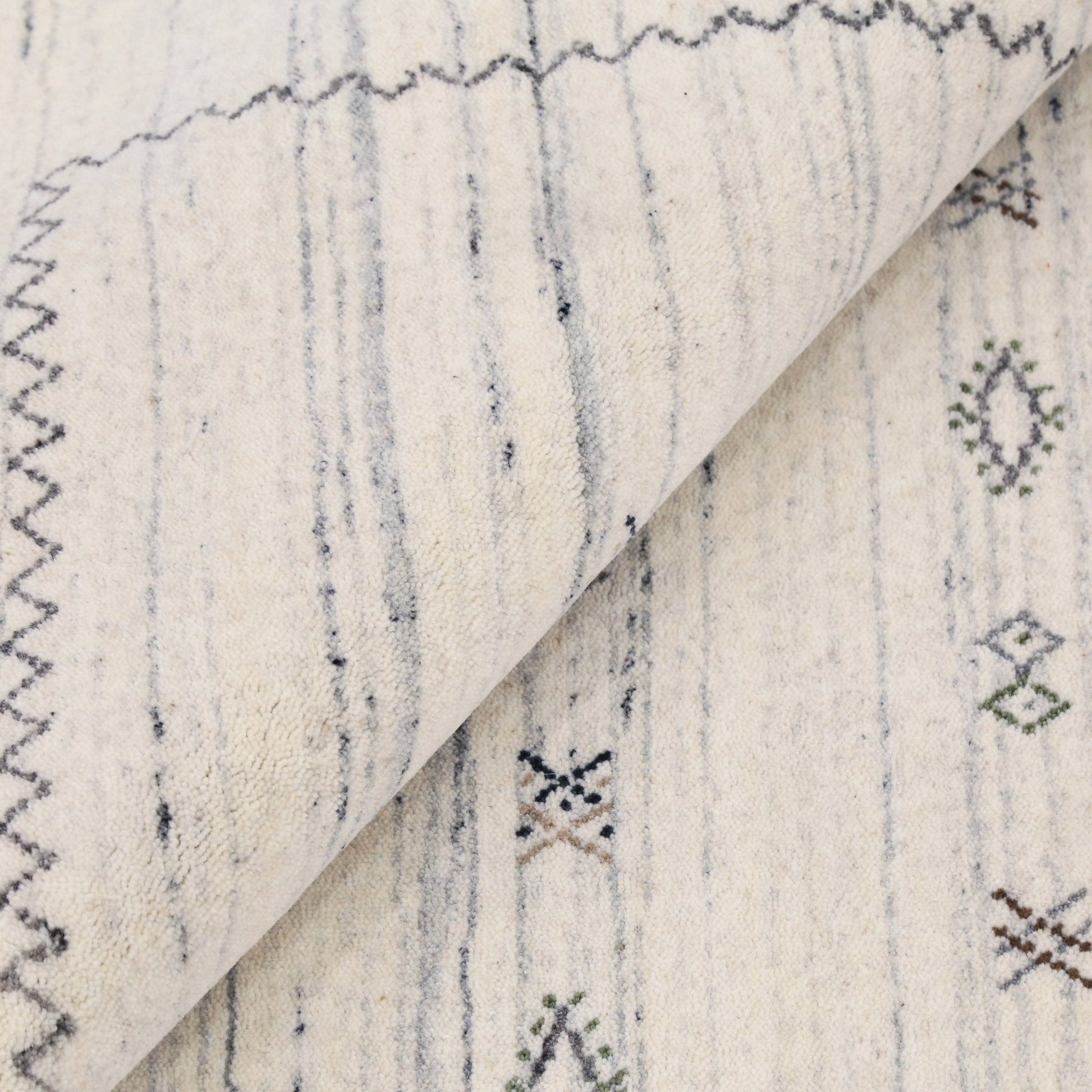Ivory Modern Tribals Design Hand Loomed Wool Area Rug.
