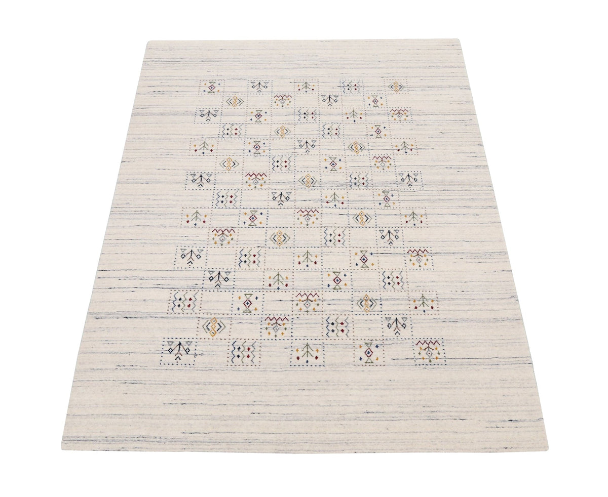 Ivory Tribal Design Hand Loomed Wool Area Rug.