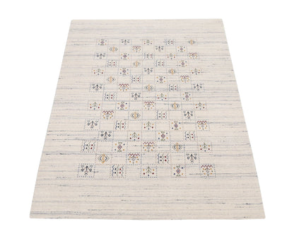 Ivory Tribal Design Hand Loomed Wool Area Rug.