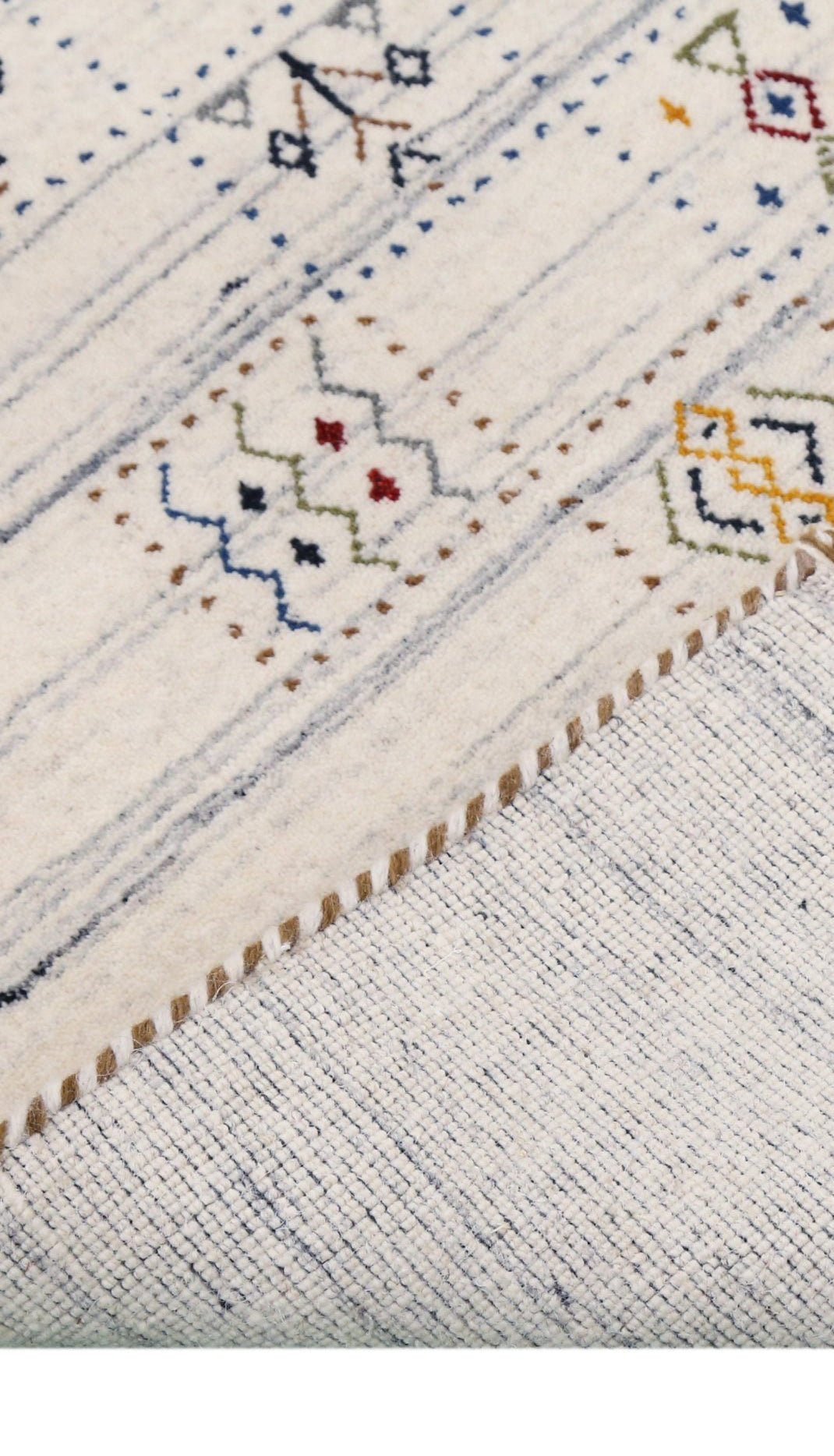 Ivory Tribal Design Hand Loomed Wool Area Rug.