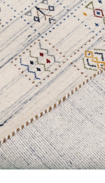 Ivory Tribal Design Hand Loomed Wool Area Rug.