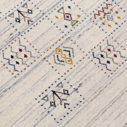 Ivory Tribal Design Hand Loomed Wool Area Rug.