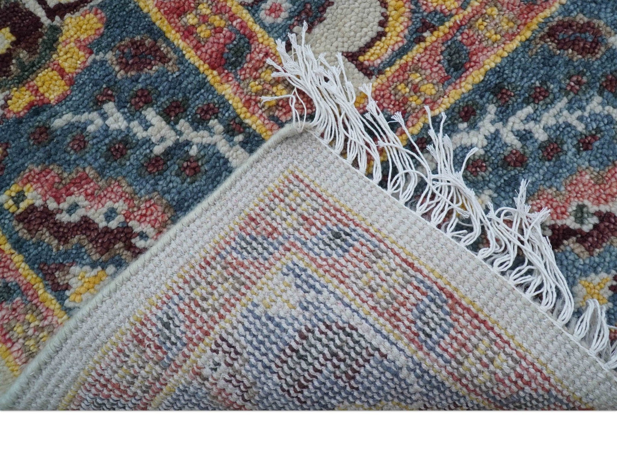 Kelly Turkish Design Ivory And Blue Hand Knotted Wool Rug.