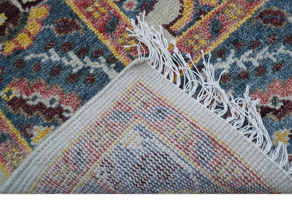 Kelly Turkish Design Ivory And Blue Hand Knotted Wool Rug.