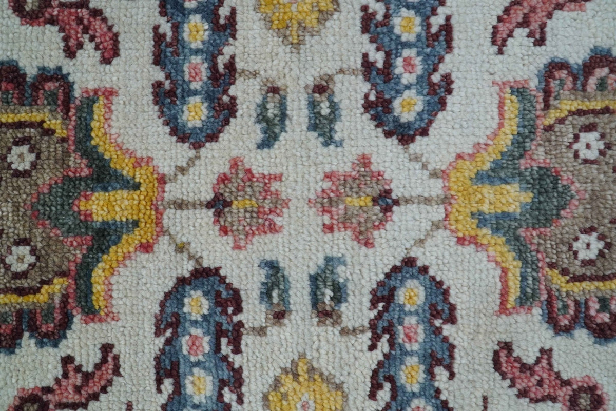 Kelly Turkish Design Ivory And Blue Hand Knotted Wool Rug.
