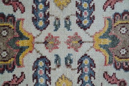 Kelly Turkish Design Ivory And Blue Hand Knotted Wool Rug.