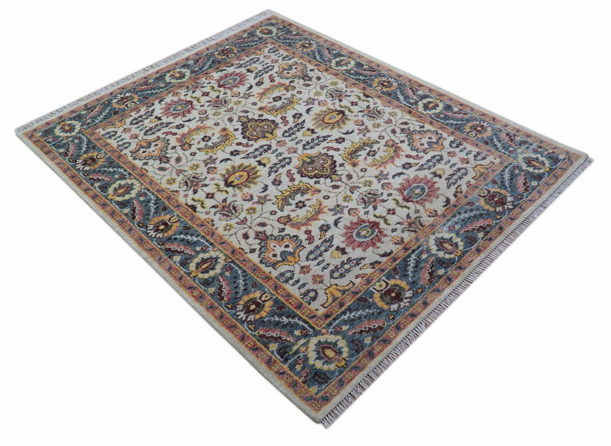 Kelly Turkish Design Ivory And Blue Hand Knotted Wool Rug.