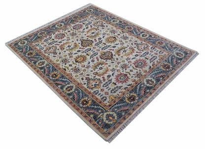 Kelly Turkish Design Ivory And Blue Hand Knotted Wool Rug.