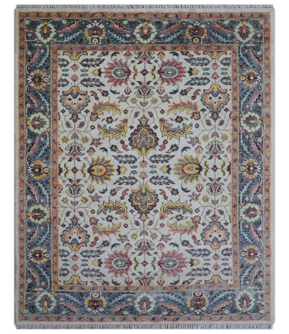 Kelly Turkish Design Ivory And Blue Hand Knotted Wool Rug.