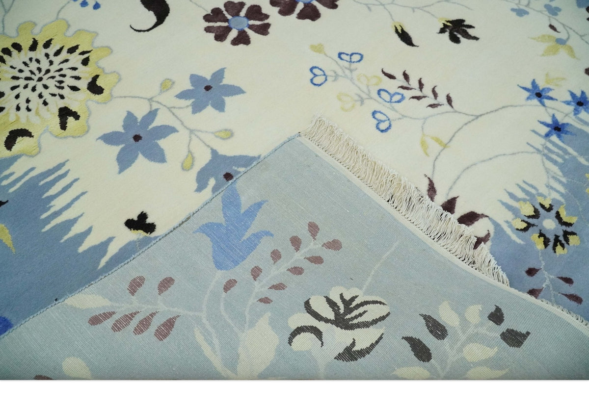 Light Blue, Ivory, Charcoal and Brown Hand Knotted Traditional Floral 6.6x10 Wool Area Rug.