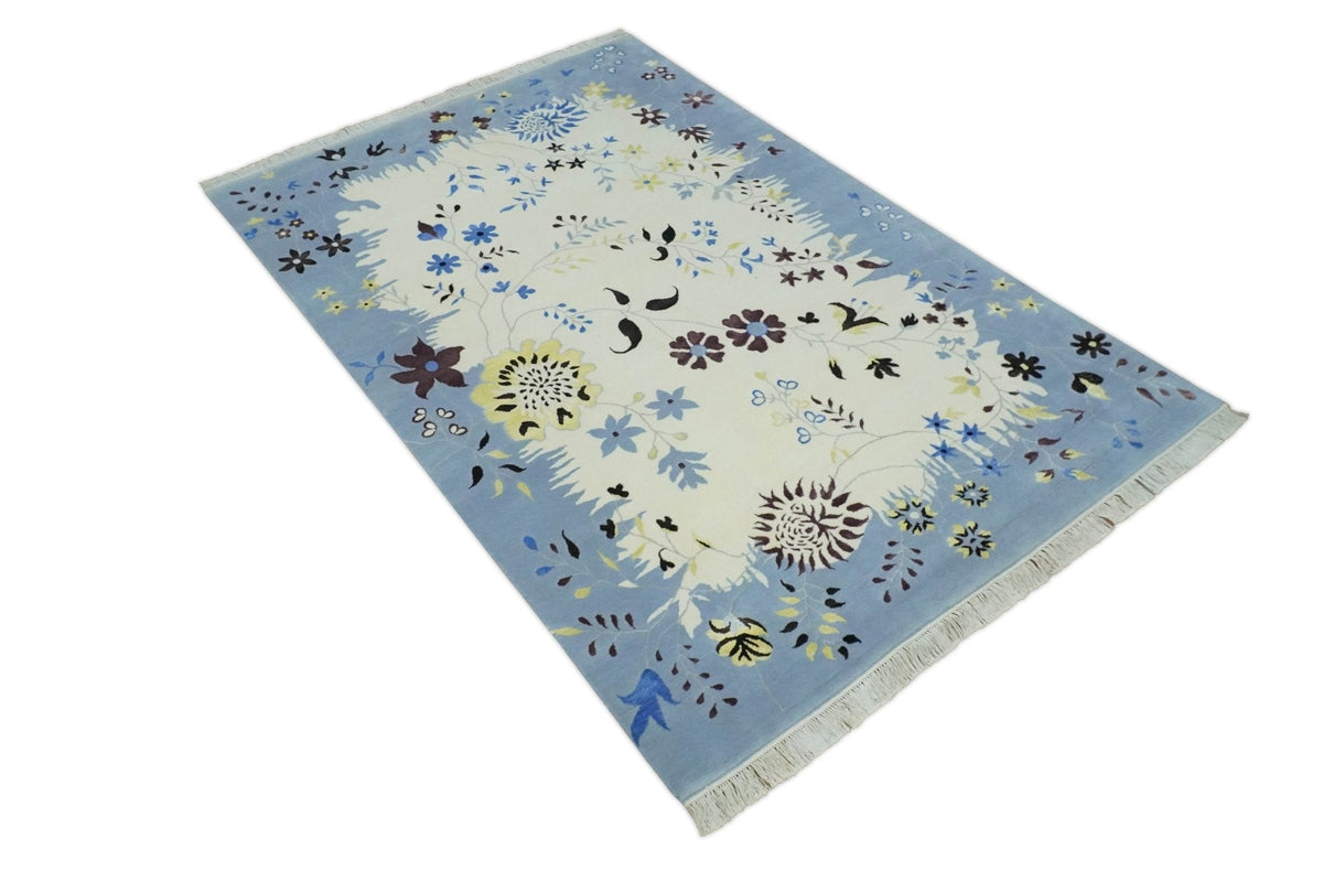 Light Blue, Ivory, Charcoal and Brown Hand Knotted Traditional Floral 6.6x10 Wool Area Rug.