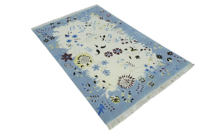 Light Blue, Ivory, Charcoal and Brown Hand Knotted Traditional Floral 6.6x10 Wool Area Rug.