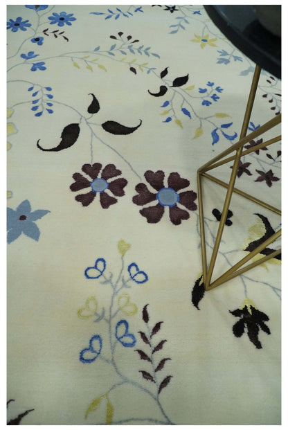 Light Blue, Ivory, Charcoal and Brown Hand Knotted Traditional Floral 6.6x10 Wool Area Rug.