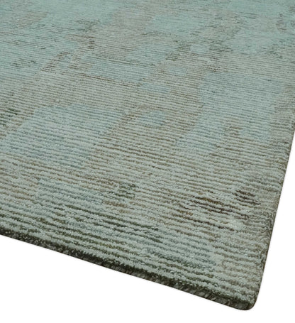 Modern Abstract Teal, Olive and Ivory Hand Tufted Multi Size wool area rug.