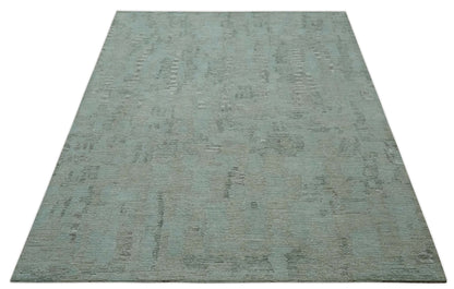 Modern Abstract Teal, Olive and Ivory Hand Tufted Multi Size wool area rug.