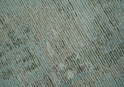 Modern Abstract Teal, Olive and Ivory Hand Tufted Multi Size wool area rug.