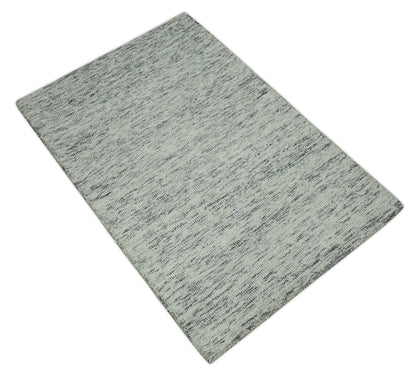 Modern Beige and Charcoal Solid Shaded Hand Tufted Natural Wool Area Rug.