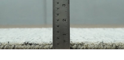 Modern Beige and Charcoal Solid Shaded Hand Tufted Natural Wool Area Rug.