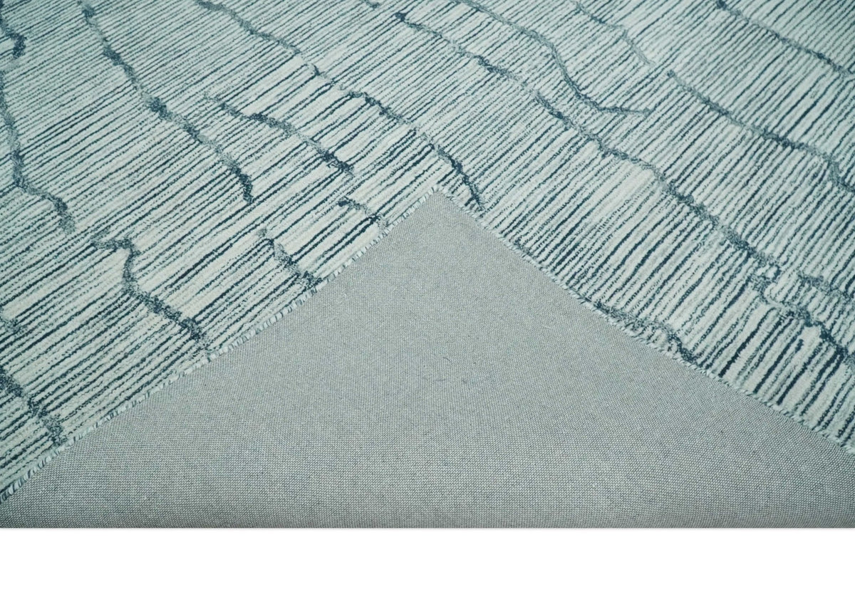Modern Contemporary Woolen White and Blue Hand Tufted Area Rug.