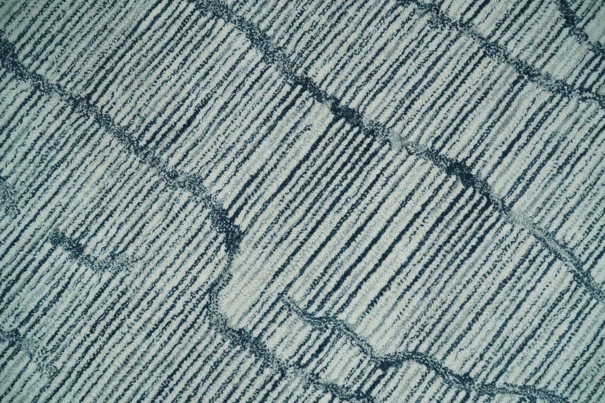 Modern Contemporary Woolen White and Blue Hand Tufted Area Rug.