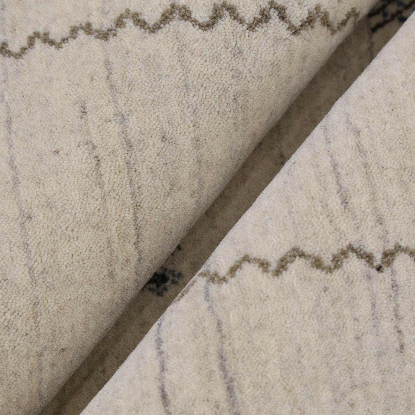 Modern Design Beige Hand Loomed Wool Area Rug.