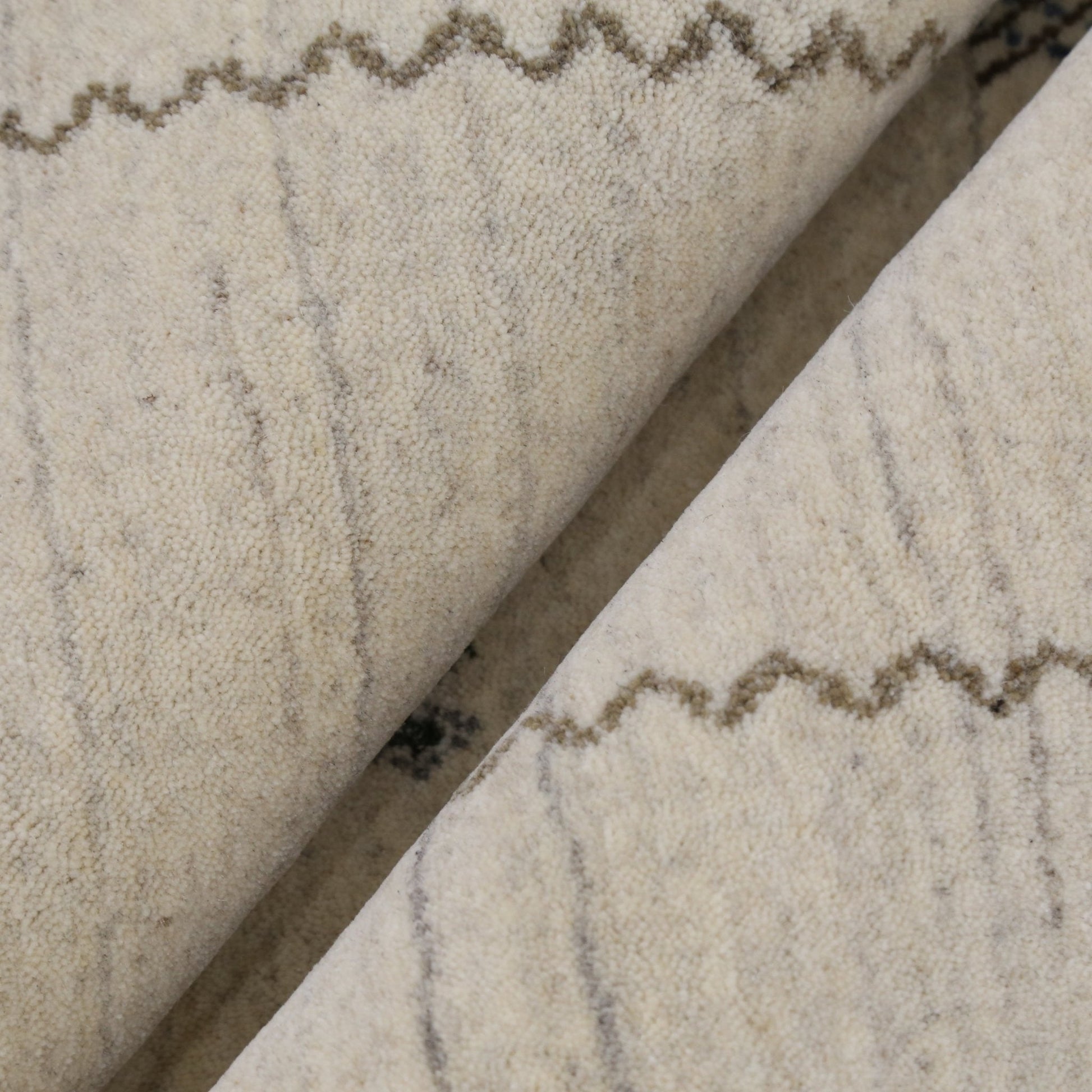 Modern Design Beige Hand Loomed Wool Area Rug.