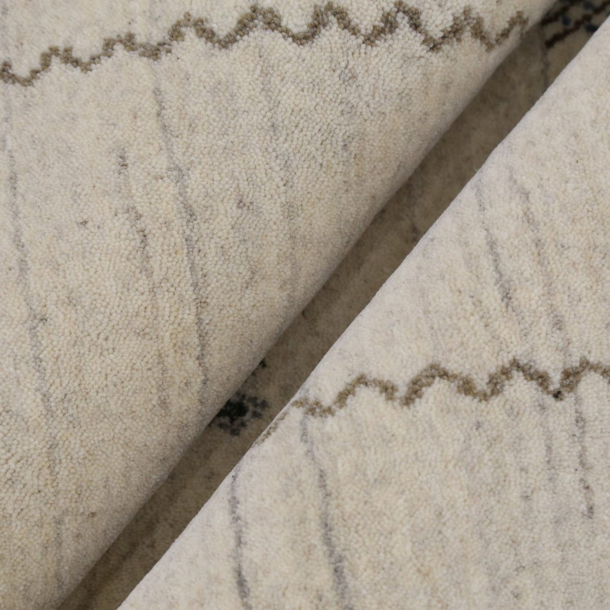 Modern Design Beige Hand Loomed Wool Area Rug.